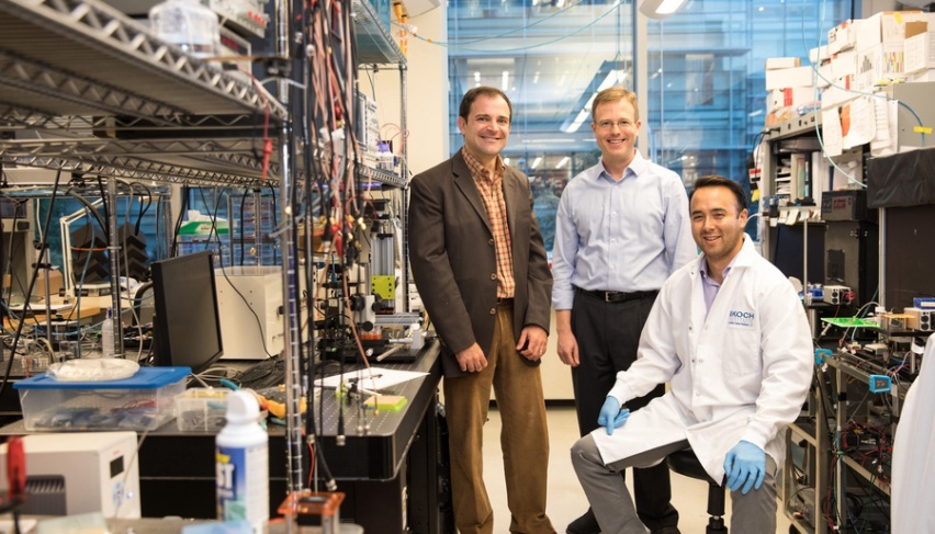 three researchers in a lab