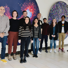 A group of scholars in the Koch Institute Public Galleries