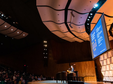 speaker onstage at MIT's Kresge Hall